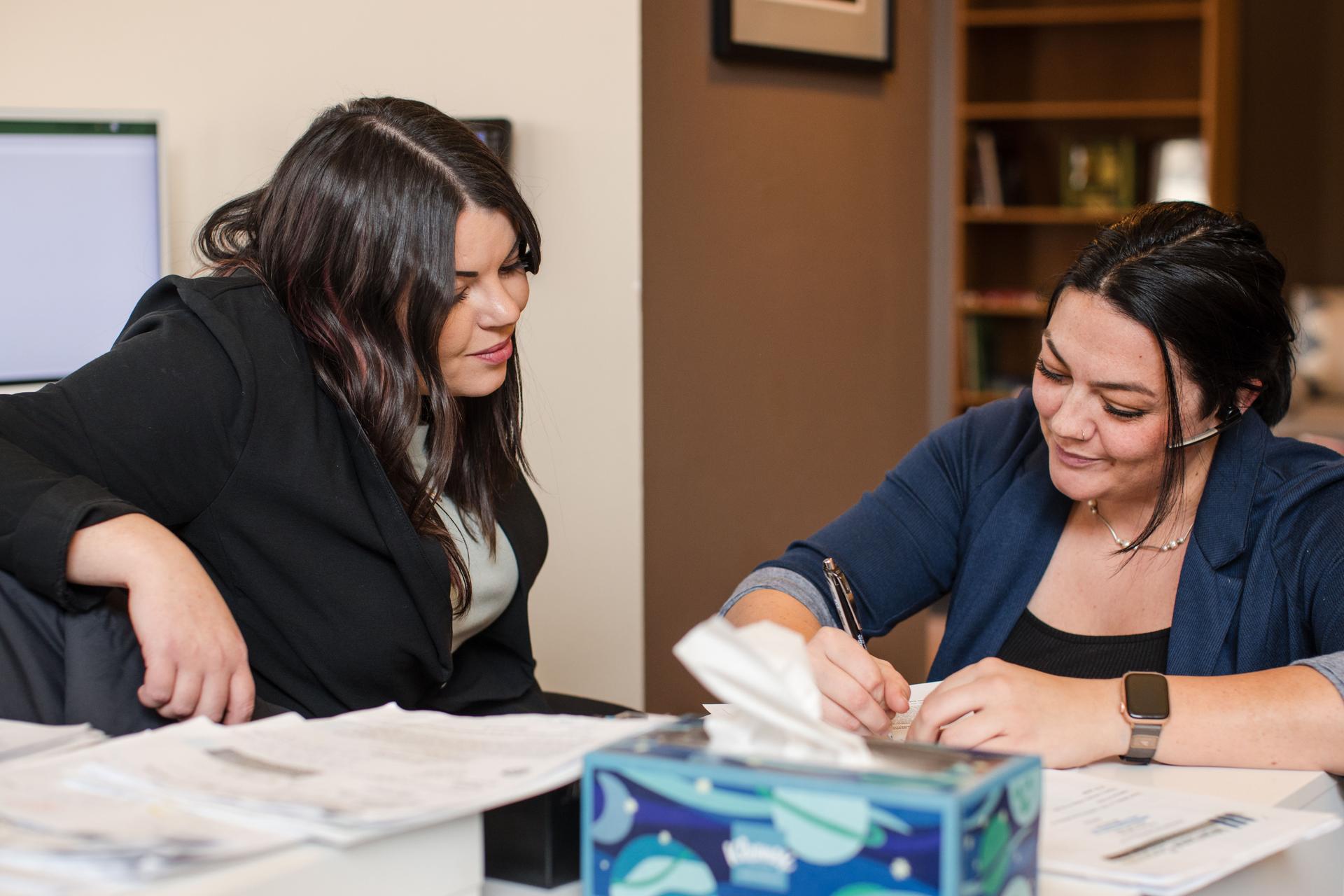 Montana Corporate team member assisting a client with vehicle registration